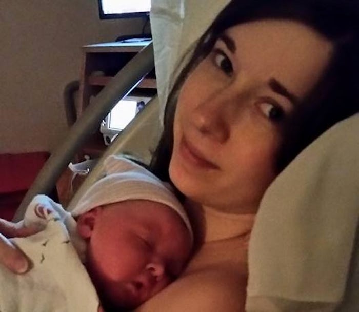 A new mom holding her newborn baby on her chest while the baby is sleeping