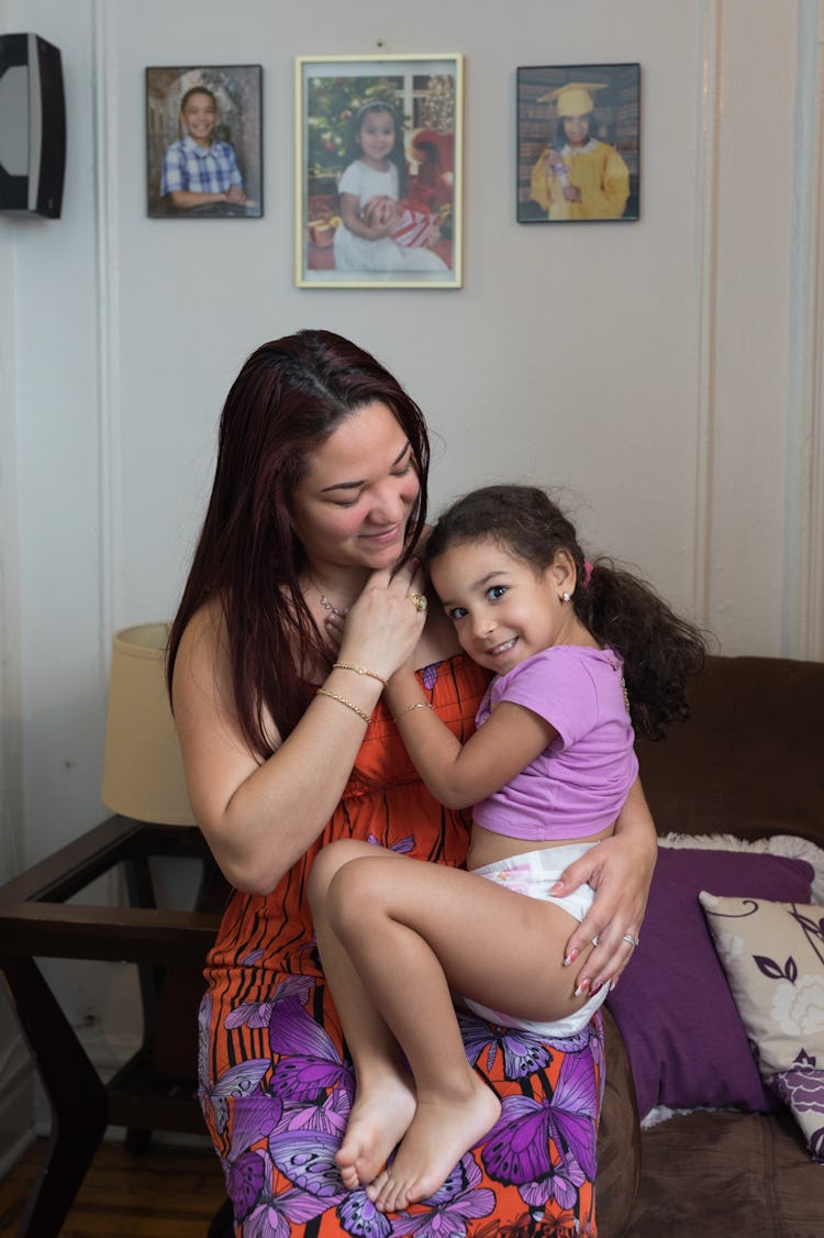  Ashley Batz holding her daughter