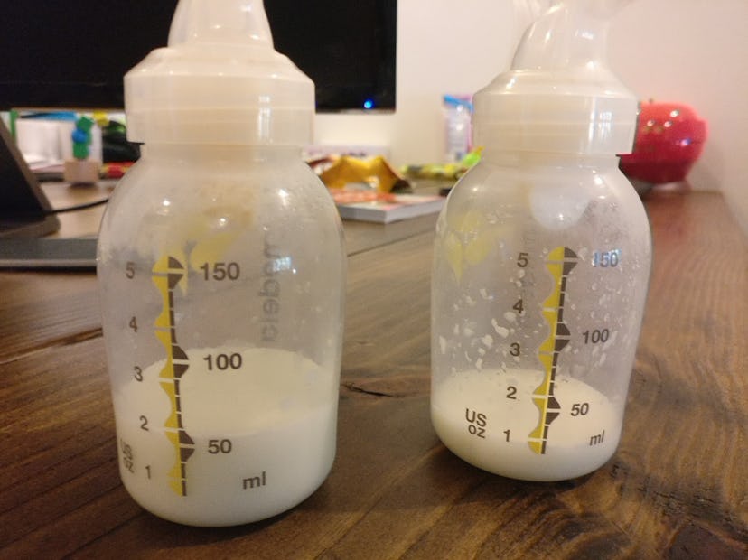 Two bottles of pumped breast milk.