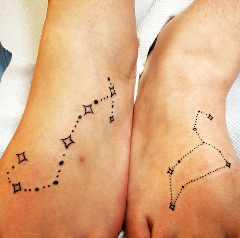 Two friends with Constellations tattoos on their feet