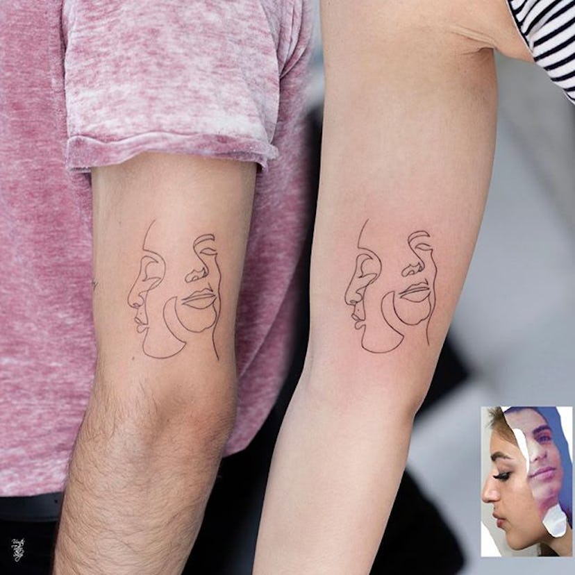 Man and woman with portrait tattoos of each other