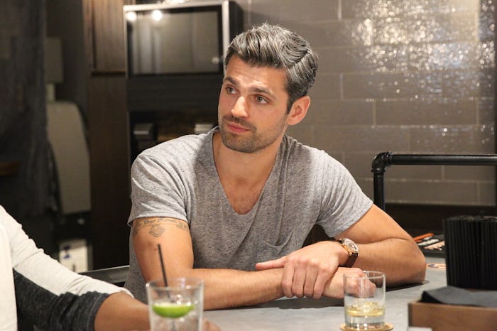 Peter from "The Bachelorette" sitting in a restaurant