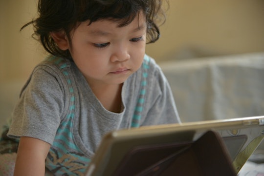 Baby in front of an ipad using its screen time