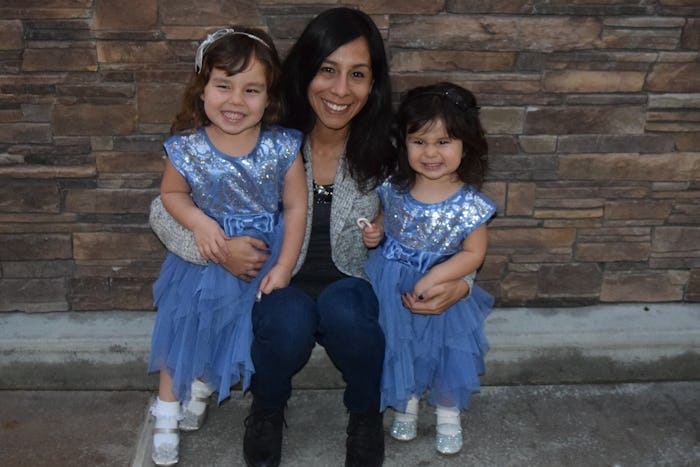 Ambrosia Brody with her two daughters in blue sequin and tulle dresses