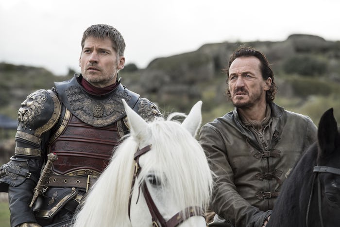Jamie Lannister and Bronn from the Game of Thrones series riding white horses