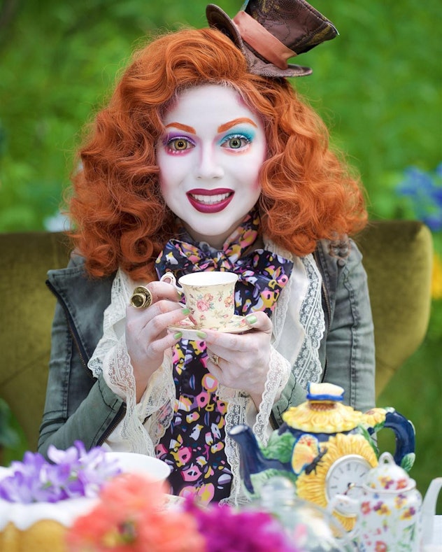 "The Mad Hatter" inspired makeup and costume look a woman is wearing for the Halloween