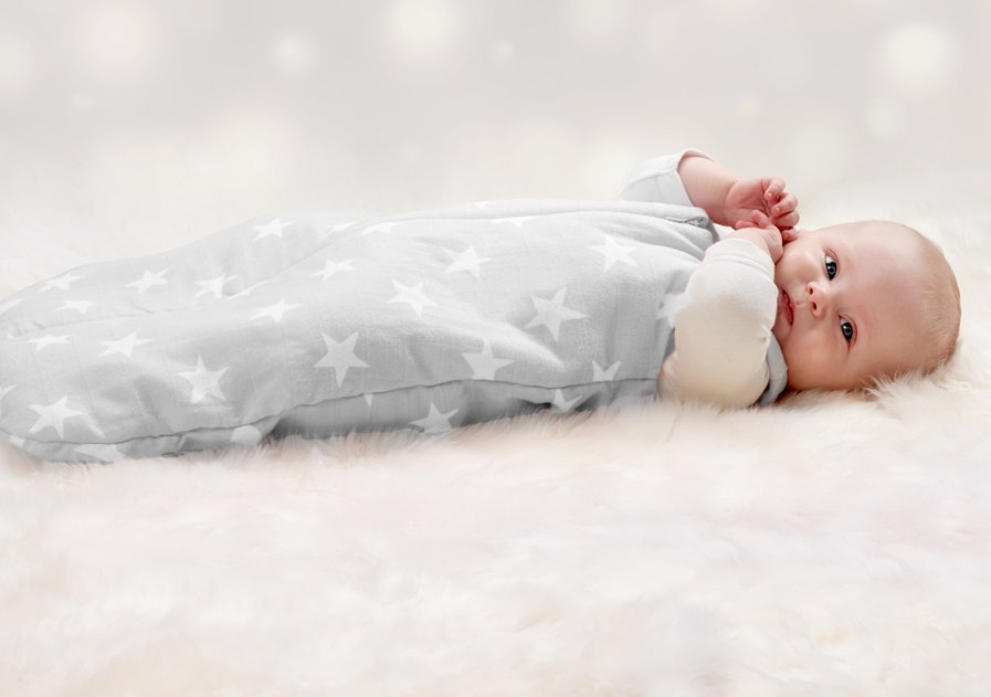 Baby sleeping in fleece sales pajamas