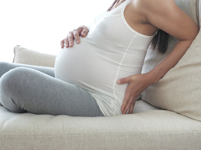 Back pain can mean several things during pregnancy, including that labor is close to starting, exper...