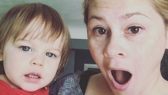 Kelly Green, who did not want her partner to see her naked after she gave birth, in a selfie with he...