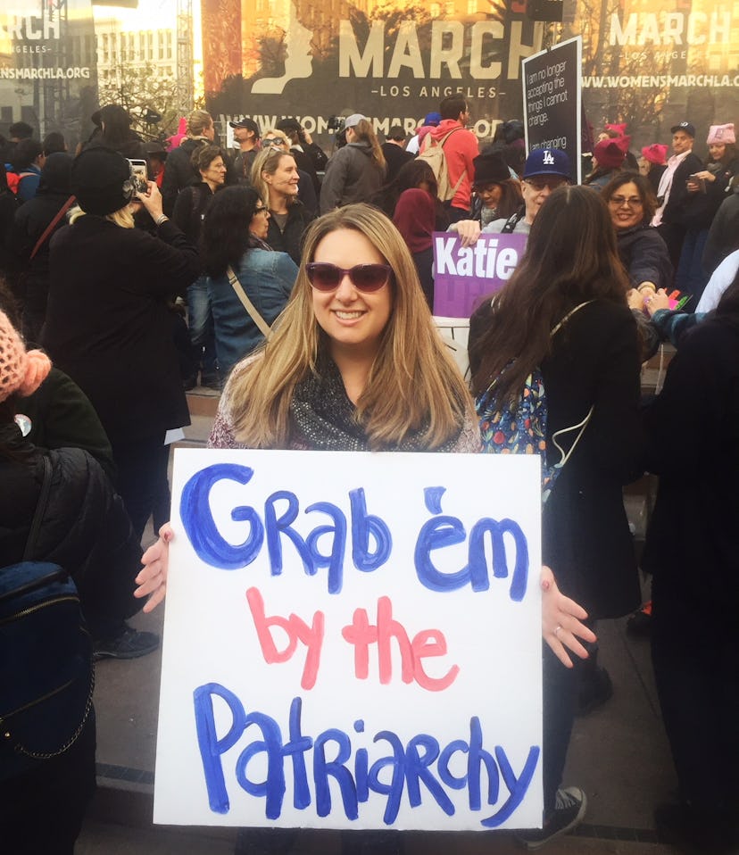 Kate holding a sign at the Women's March in the LA