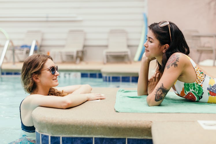 A woman makes a move on a friend.
