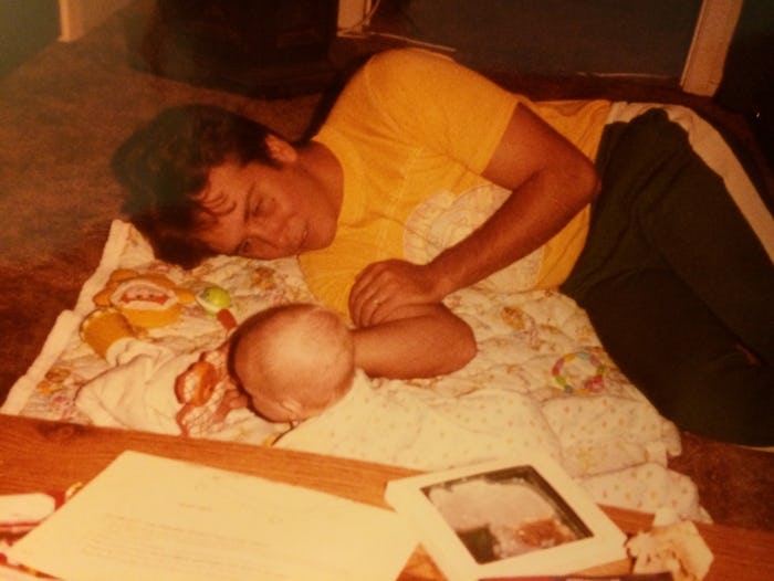 A baby and mother bed-sharing