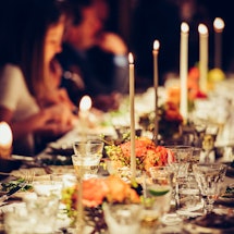 A table served full of food at a family gathering