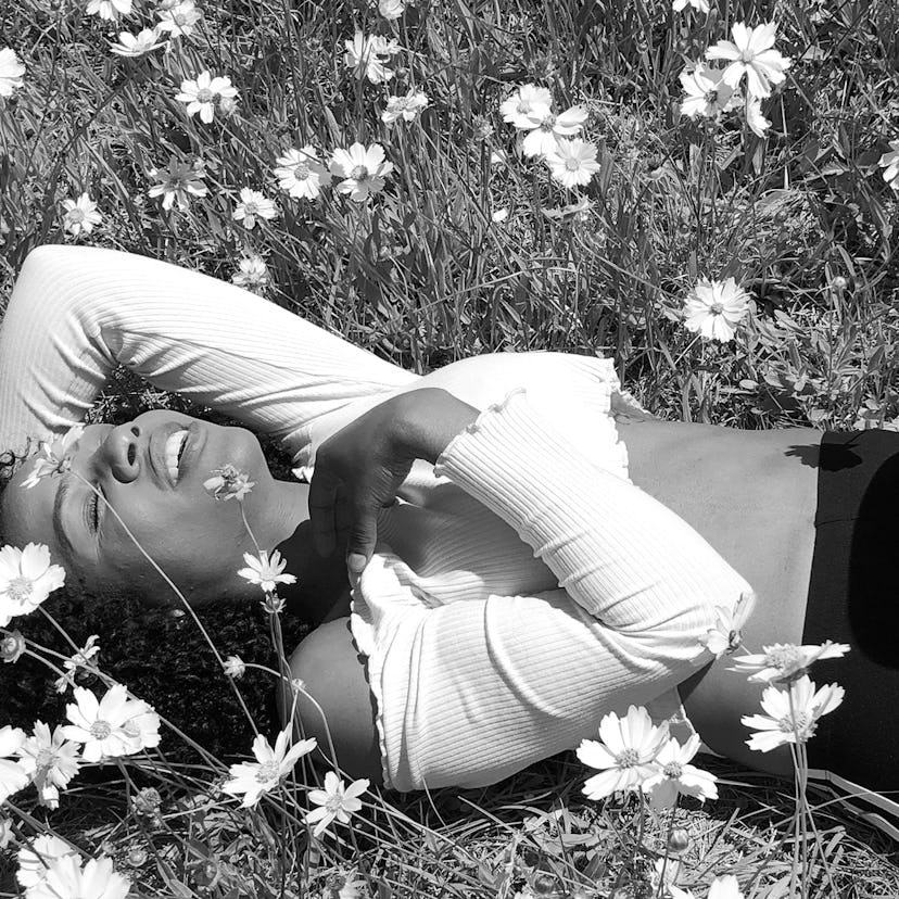 22 year old Jessica lying down in the grass