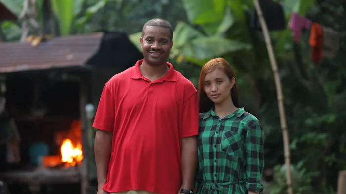 Tarik & Hazel from '90 Day Fiancé' posing for a photo