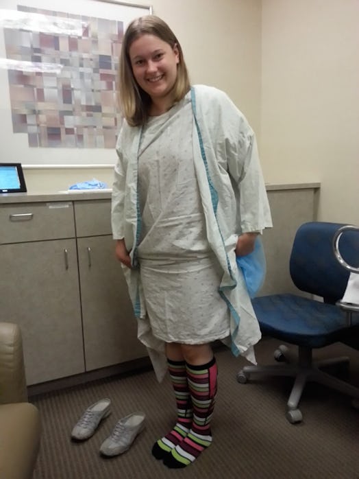 Infertile woman wearing long colorful socks in hospital