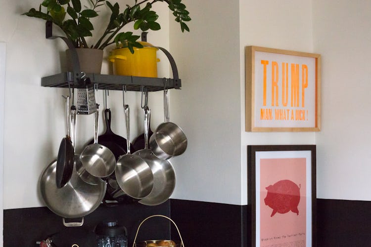 The hanging pots in Emily Farris's open kitchen shelving in the Boozy Bungalow