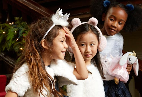 Three little girls in festive outfits from H&M