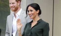 Meghan Markle waving to people with affordable jewelry on her right hand