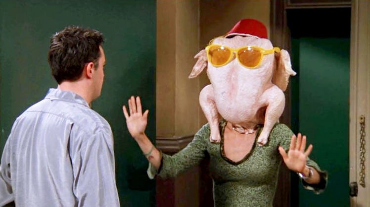 Monica (Courteney Cox) dances with a turkey on her head for Chandler (Matthew Perry) in Season 5 of ...