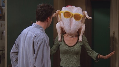 Monica dances with a turkey on her head for Chandler in Season 5 of 'Friends.'