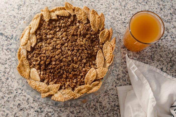 Black Bottom Oatmeal Pie served with a glass of juice for Thanksgiving