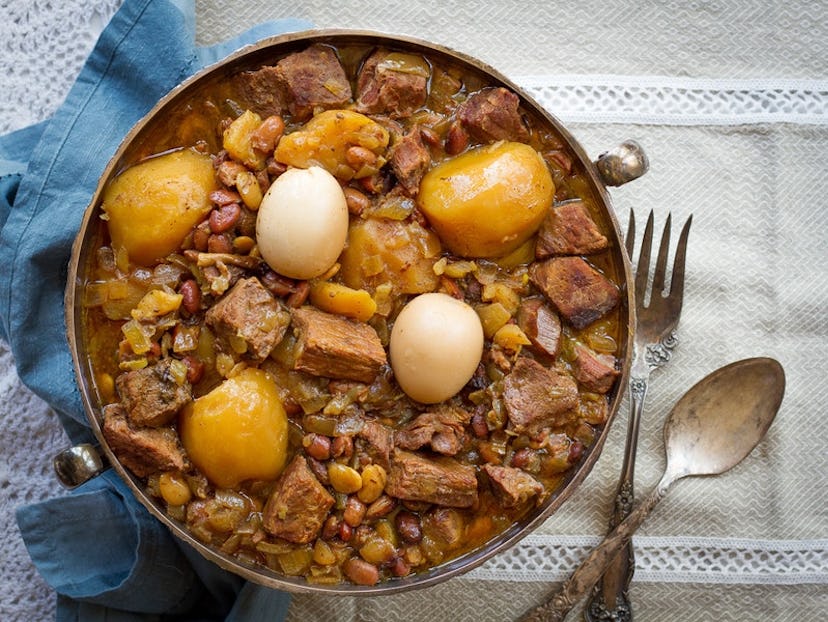 aerial view of bowl full of cooke potatoes beef and beans in a stew