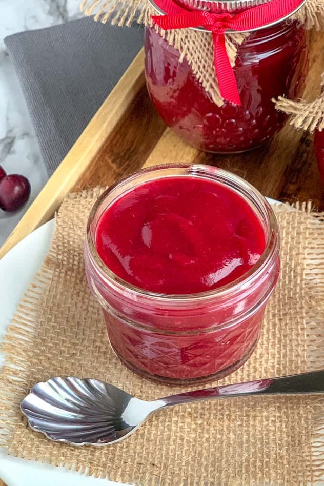glass jars of red cranberry butter