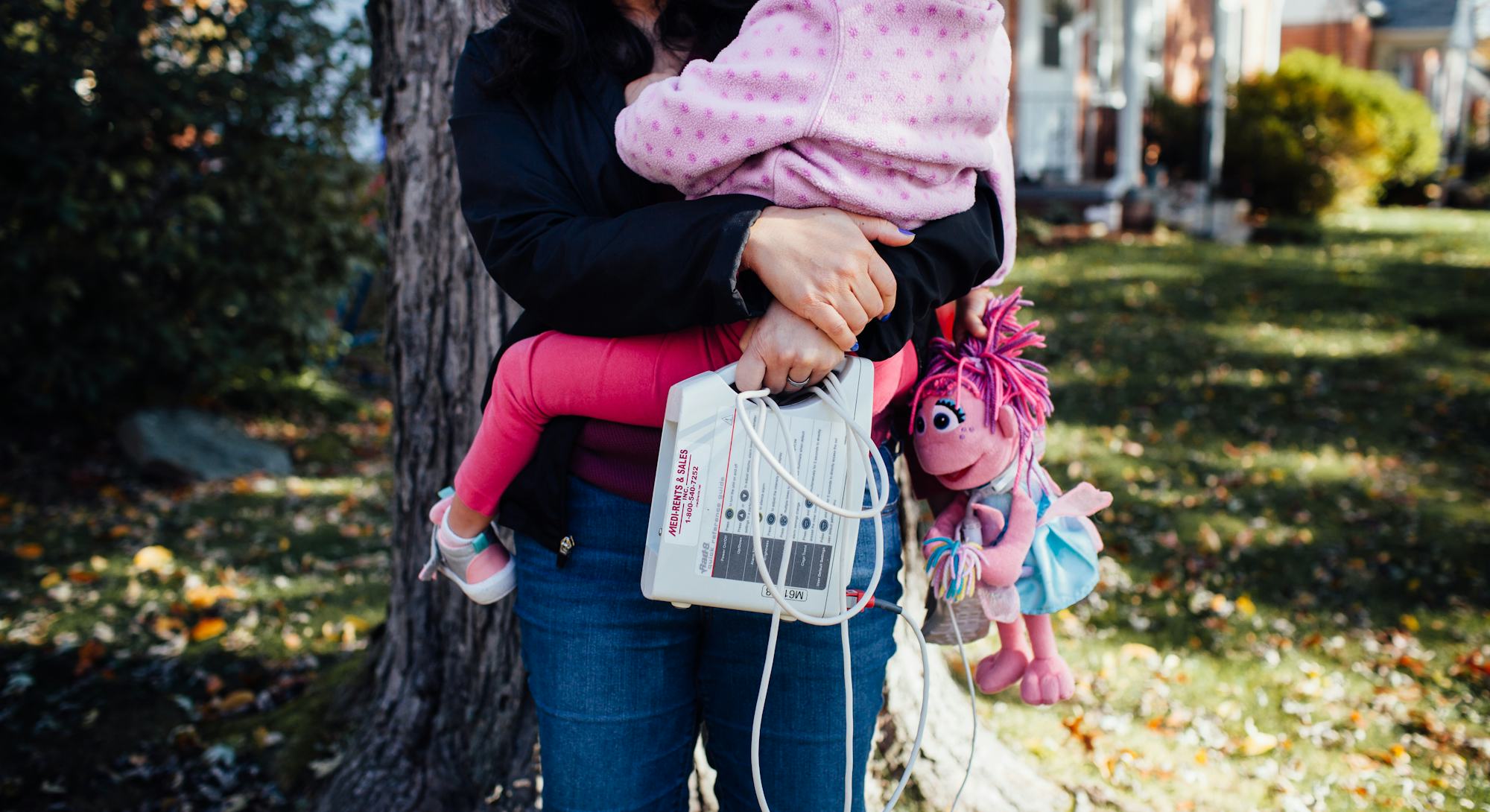 A mother with PTSD holding her daughter