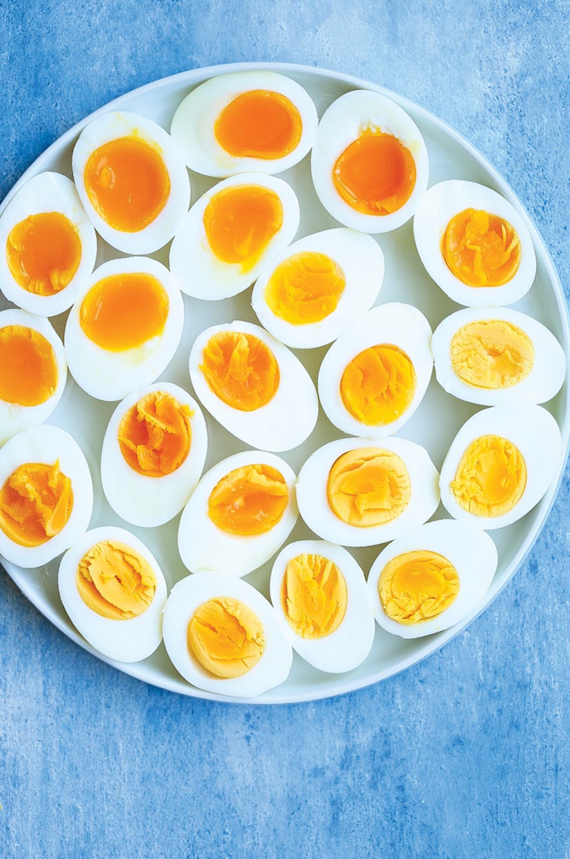 an assortment of halved boiled eggs