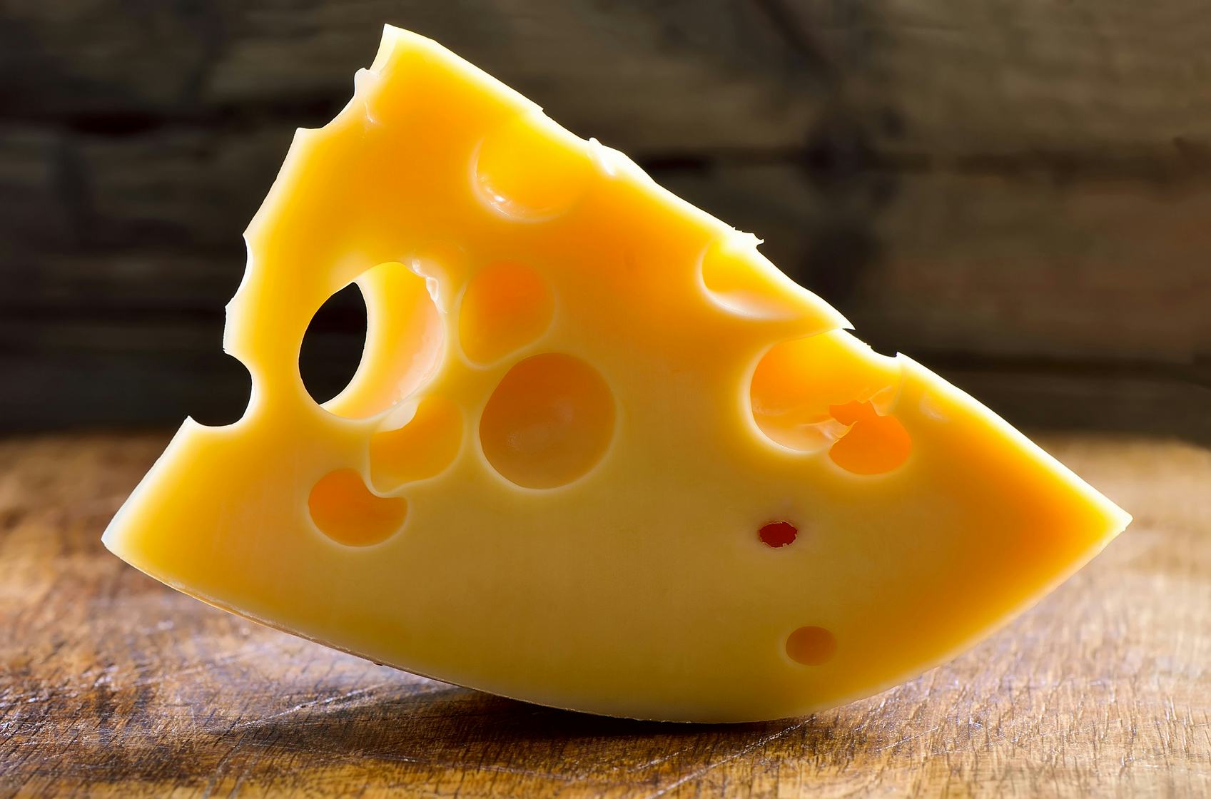 Why Does Swiss Cheese Have Holes? Science Figured It Out — And Also Why ...