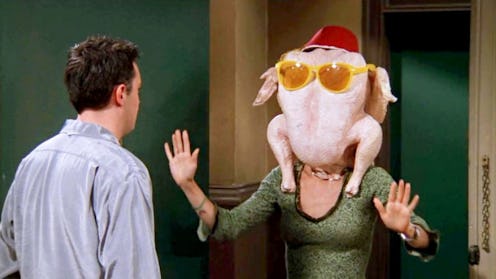 Friends thanksgiving episode, chandler looking at rachel with a turkey on her head