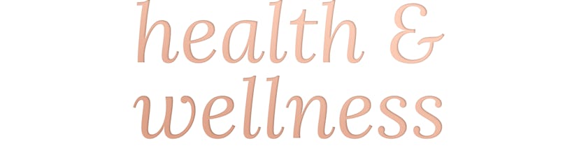 Pink "health & wellness" text on white background
