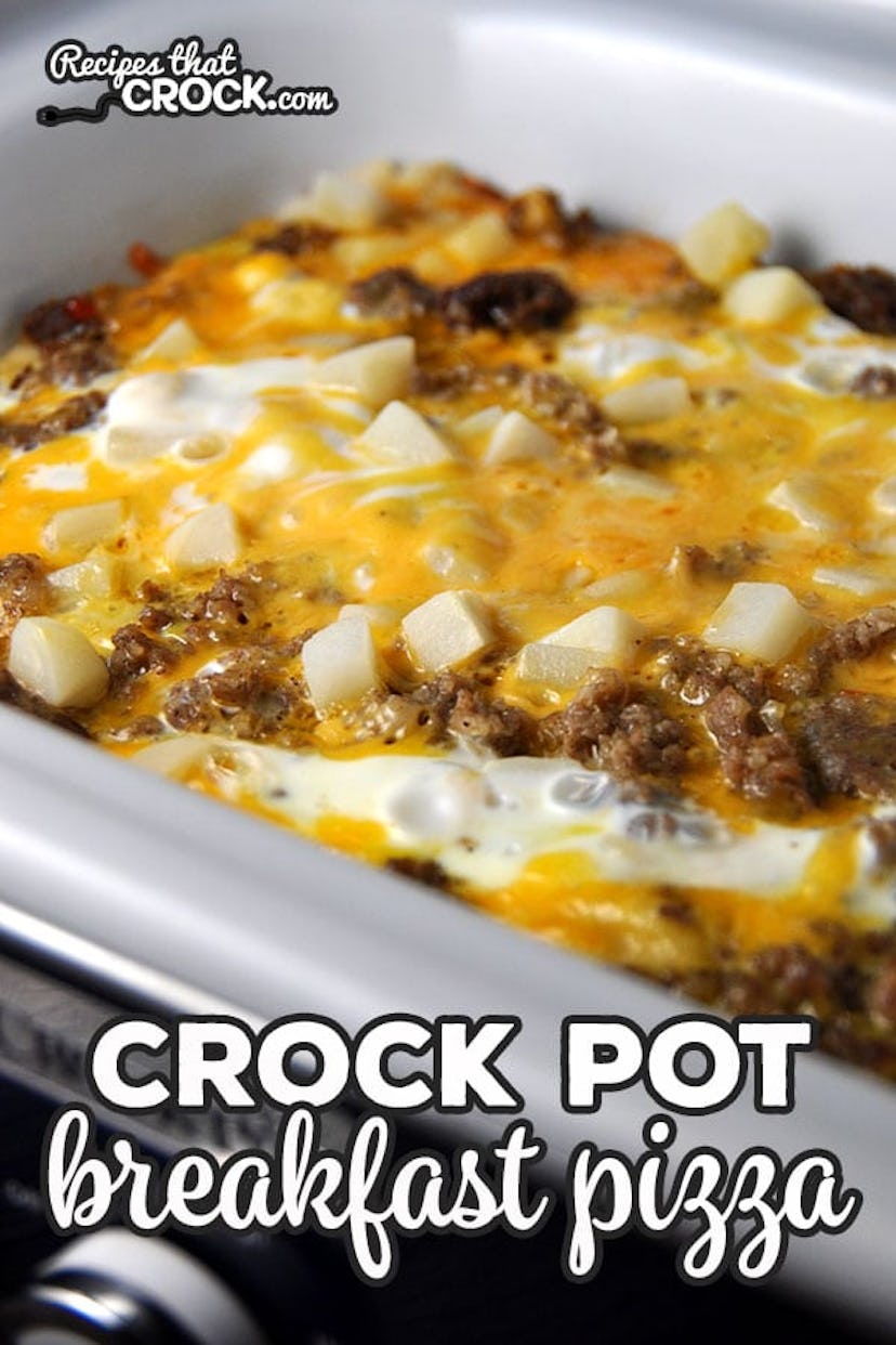 close up shot of crock pot pull of meat covered in cheese
