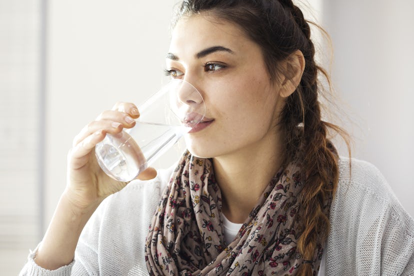 Drinking a glass of water is a good way to start the day.  