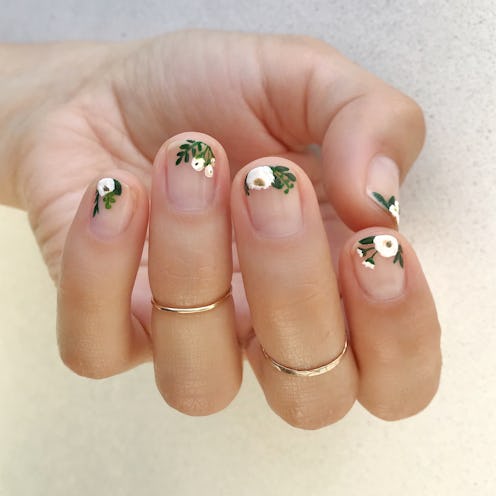 A close-up of a hand with one of the 10 nail art trends that'll be huge in 2019
