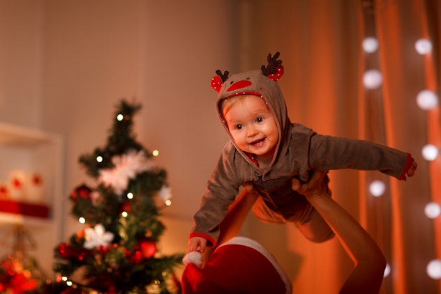 baby in reindeer outfit
