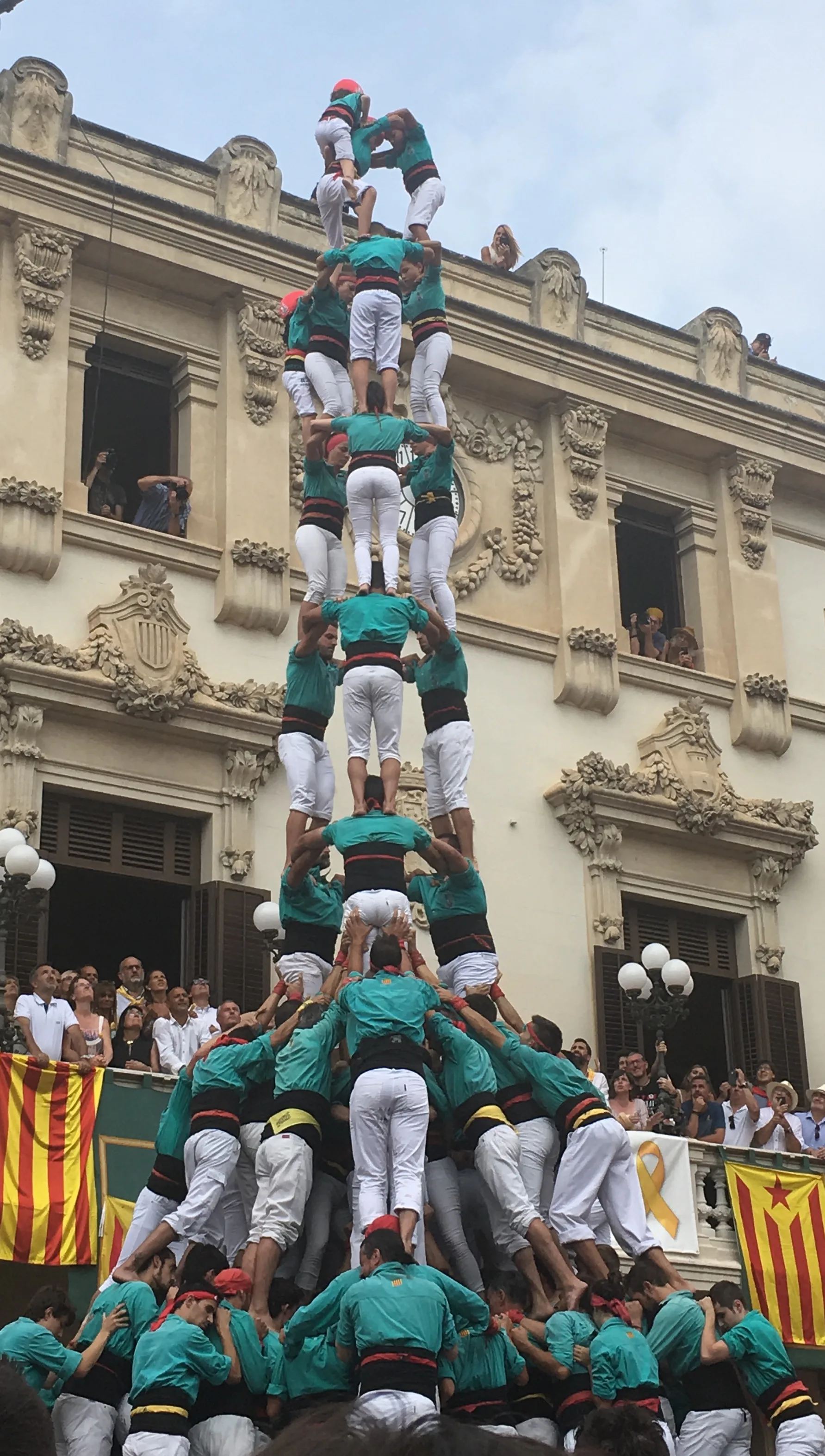 What It's Like To See Hundreds Of People Build A Human Tower