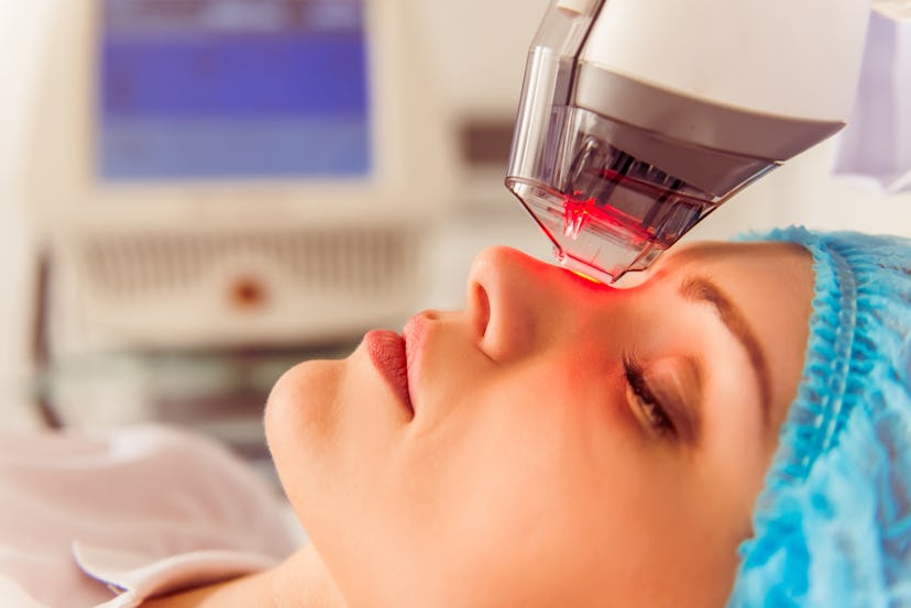 woman getting laser treatment on her face as opposed to a chemical peel