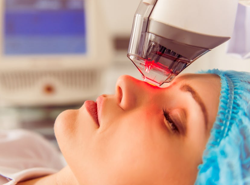 woman getting laser treatment on her face as opposed to a chemical peel