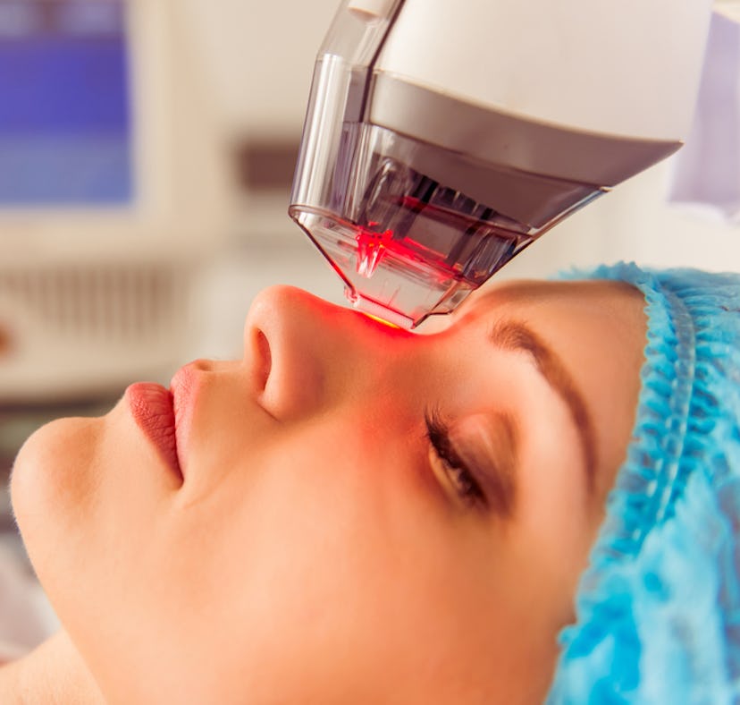 woman getting laser treatment on her face as opposed to a chemical peel