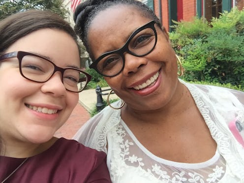 Two woman smiling and posing for a selfie showcasing the power of female friendship