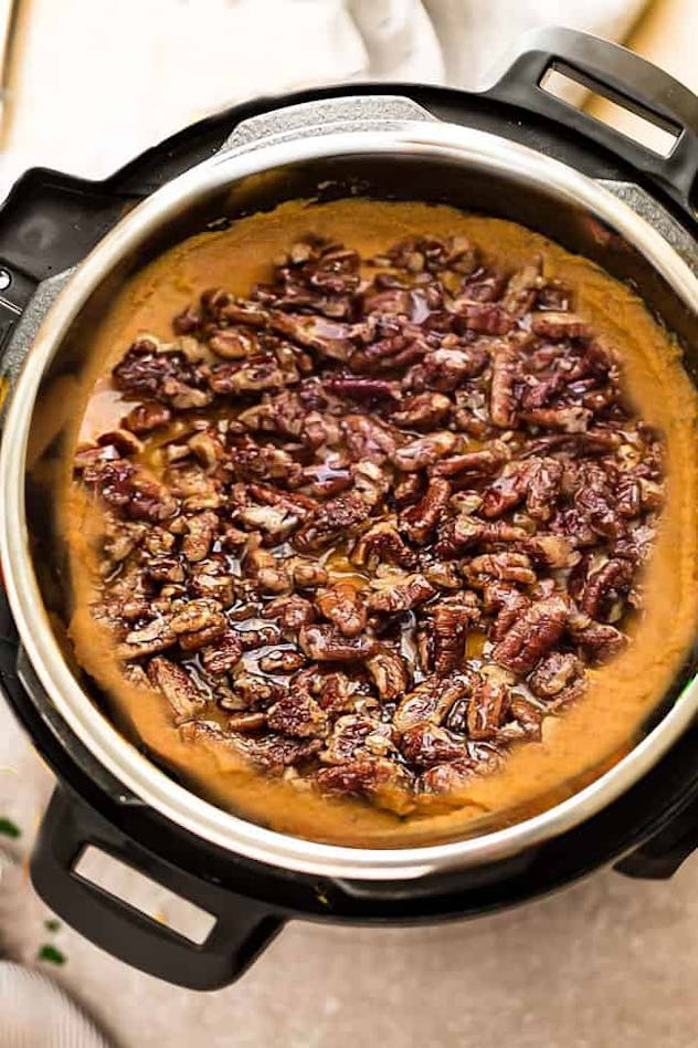 sweet potato casserole in instant pot with crushed walnuts on top