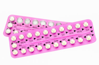 pink birth control packaging showing the days of the week when they should be taken