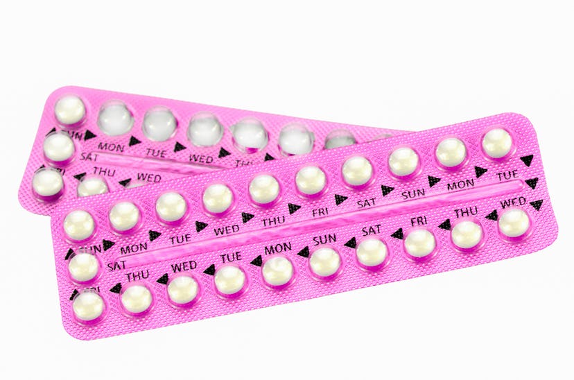 pink birth control packaging showing the days of the week when they should be taken