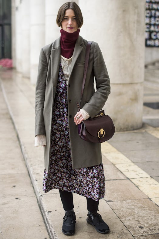 This slip dress outfit incorporates layers to keep you warm.