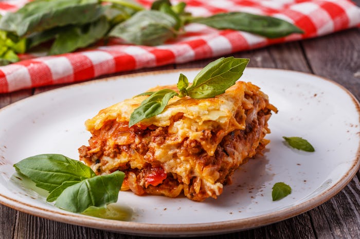 A piece of lasagna as one of the 18 Christmas Eve crock-pot recipes