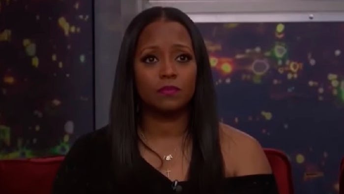 Keisha Knight Pulliam with her hair down in an off-shoulder black top in Celebrity Big Brother