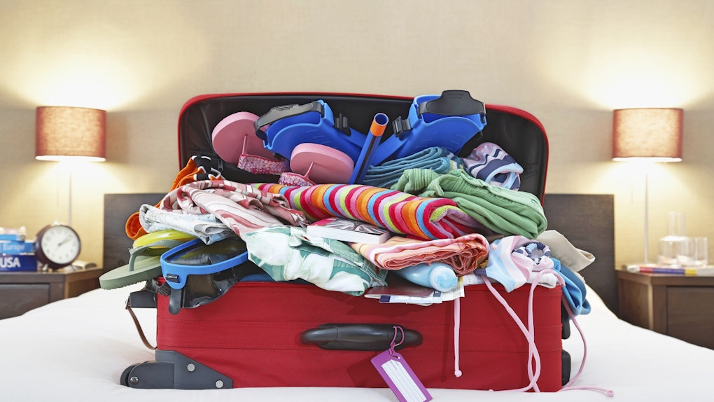 Image result for overpacked suitcase