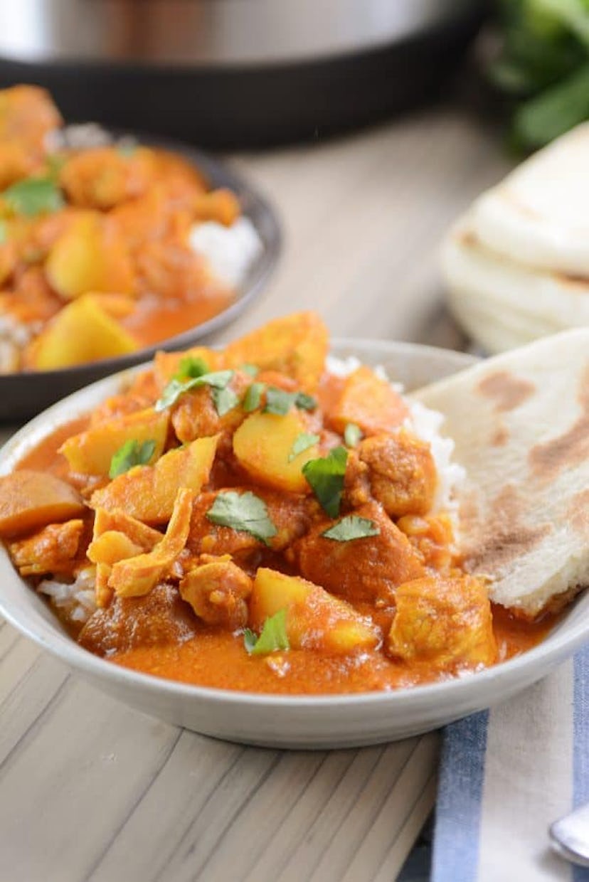  Indian Butter Chicken served with bread